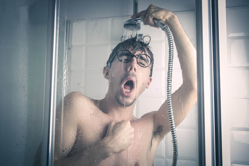 man taking a bath on a cold water