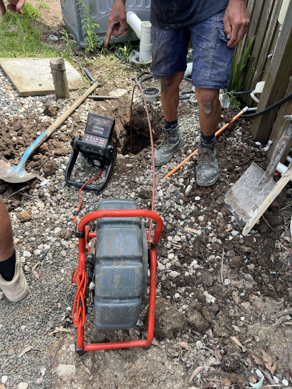 Technician using underground cable inspection equipment for EMF detection in Sydney